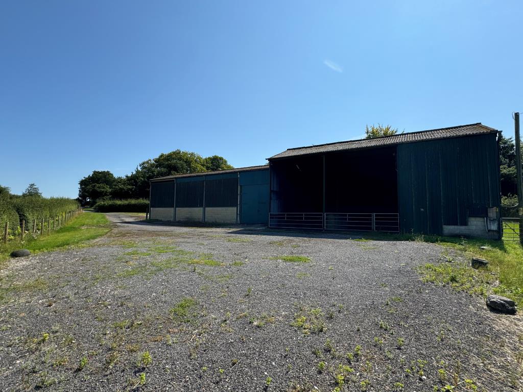 Lot: 75 - FARM BUILDINGS WITH POTENTIAL AND SIX ACRES IN A BEAUTIFUL RURAL SETTING - A Side View Looking Back towards the Entrance